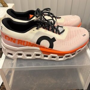 On Running Sneakers in White, Black, and Orange